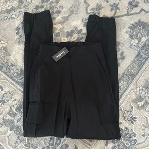 Black Boohoo tall cargo trousers with elastic waist and ankle . Size 4